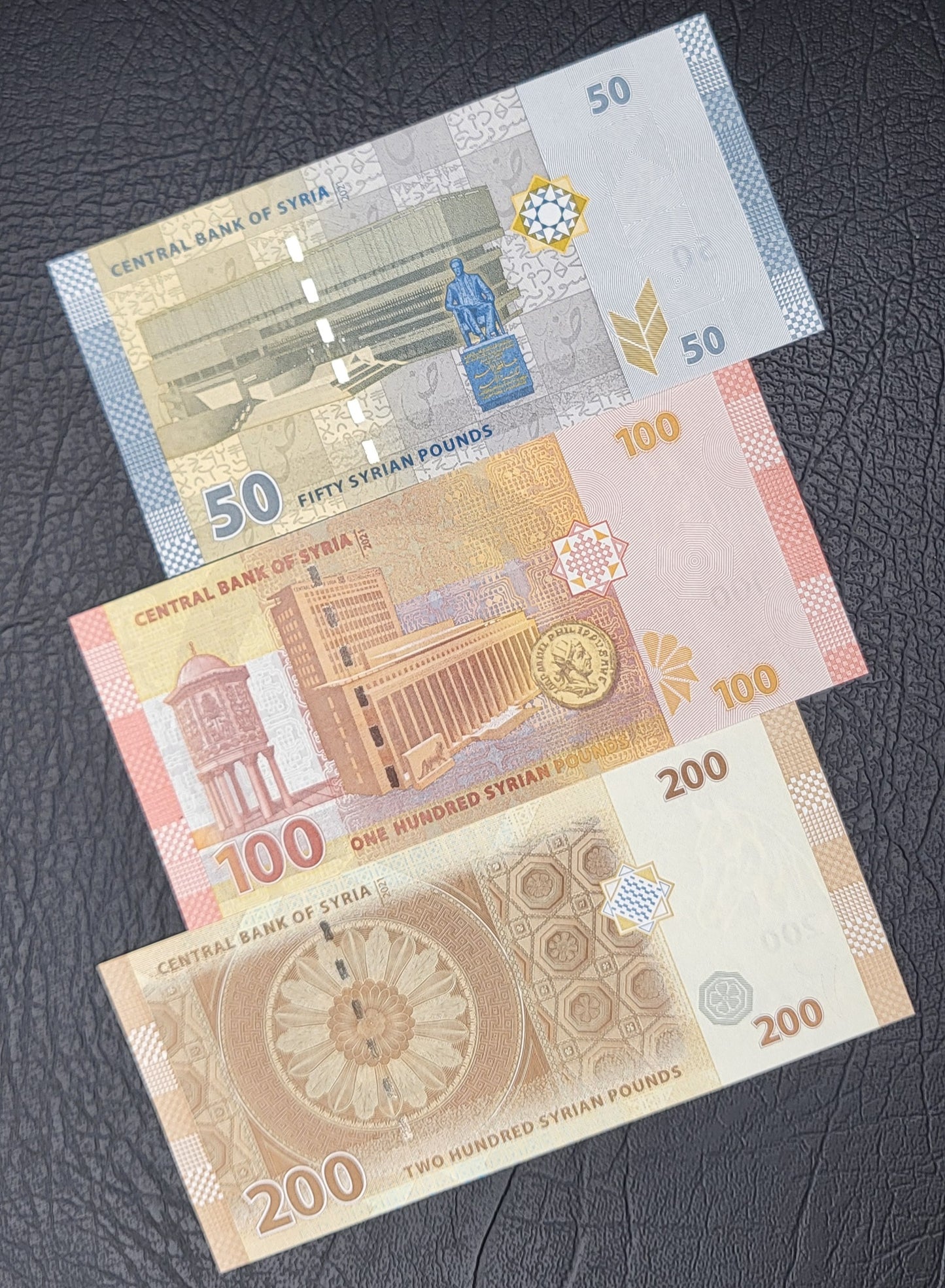 Full set Syria 50, 100, 200, 500, 1000, 2000, and 5000 Lira Syria Syrian Pounds Uncirculated UNC Crisp (Seven notes)