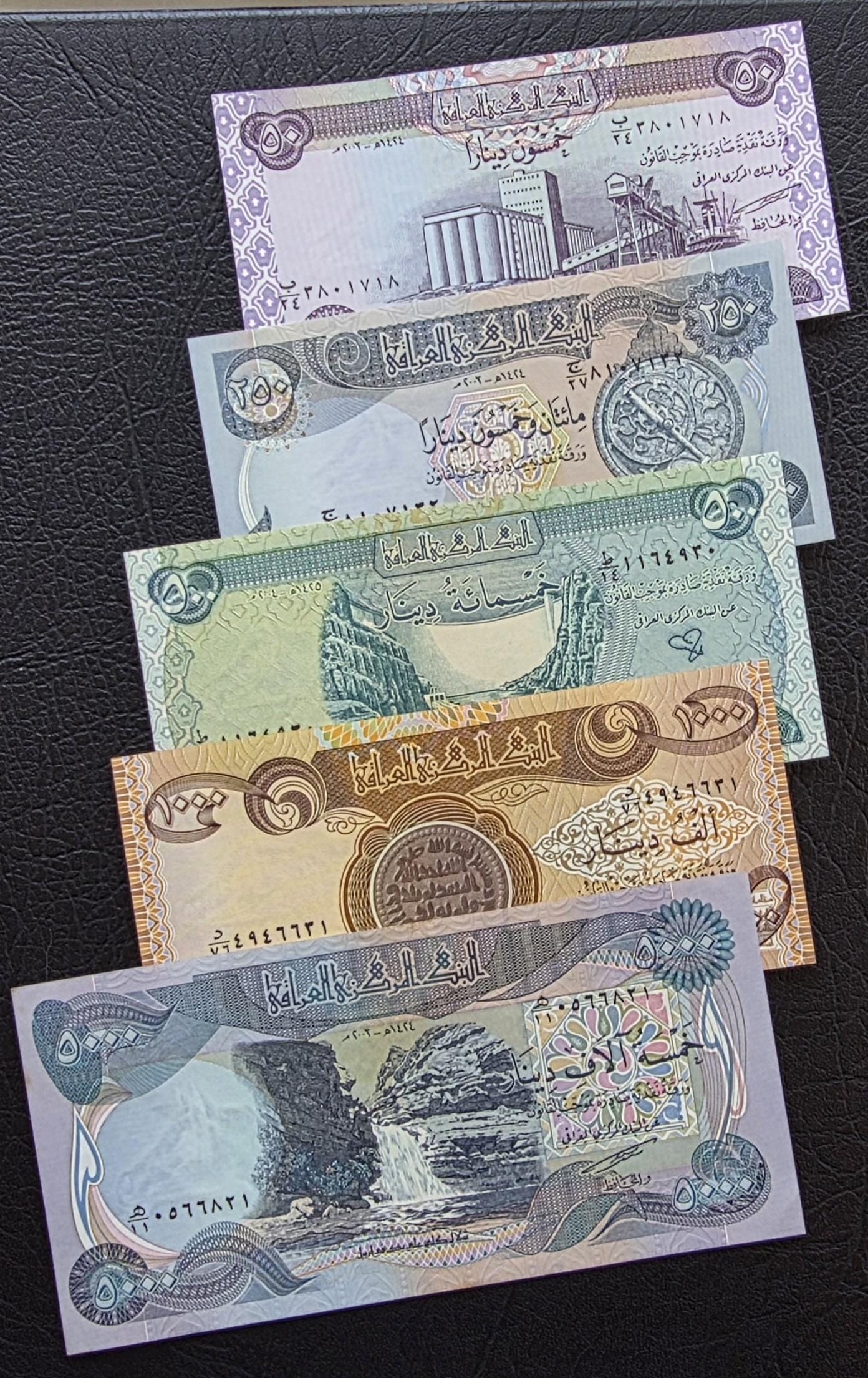 Set of 50, 250, 500, 1000, 5000 Dinars 2004 Iraq Uncirculated UNC (Five notes)- see the description