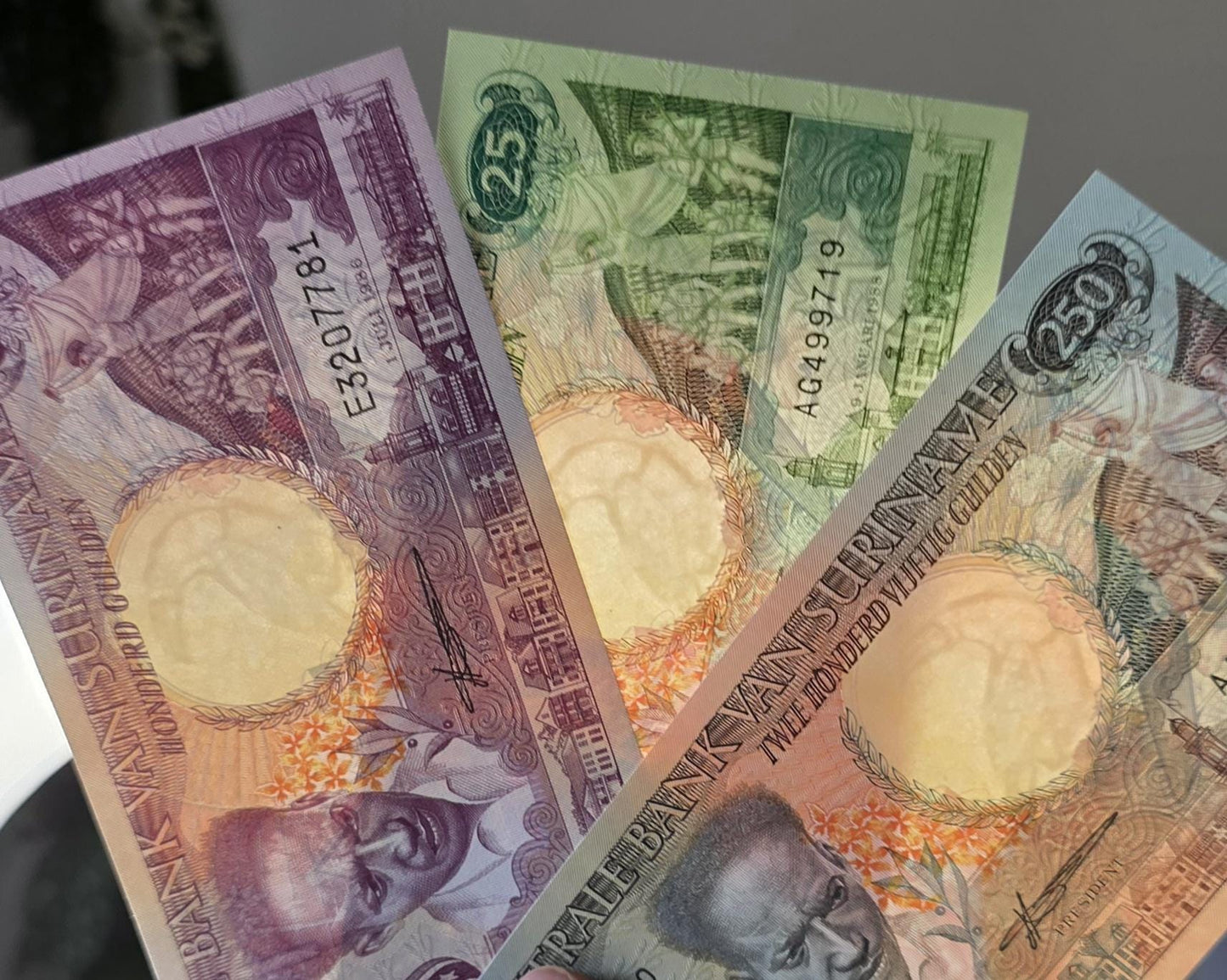Set of 25, 100 and 250 Gulden 1980s Suriname Gem Uncirculated UNC (3 banknotes)