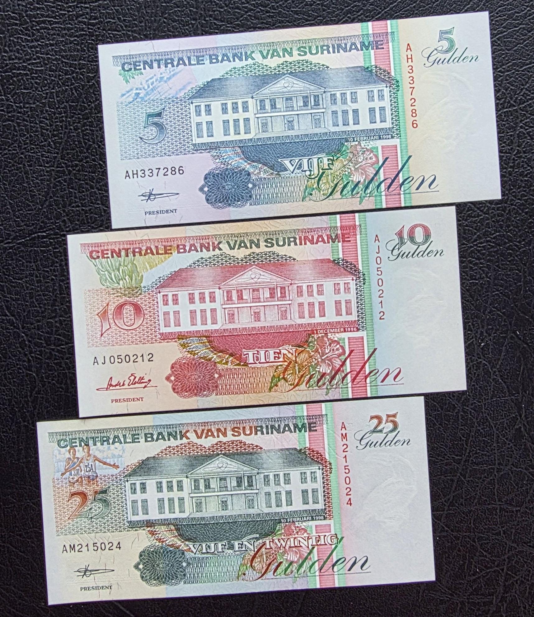 Set of 5, 10, and 25 Gulden 1989 Suriname Uncirculated UNC (three notes)