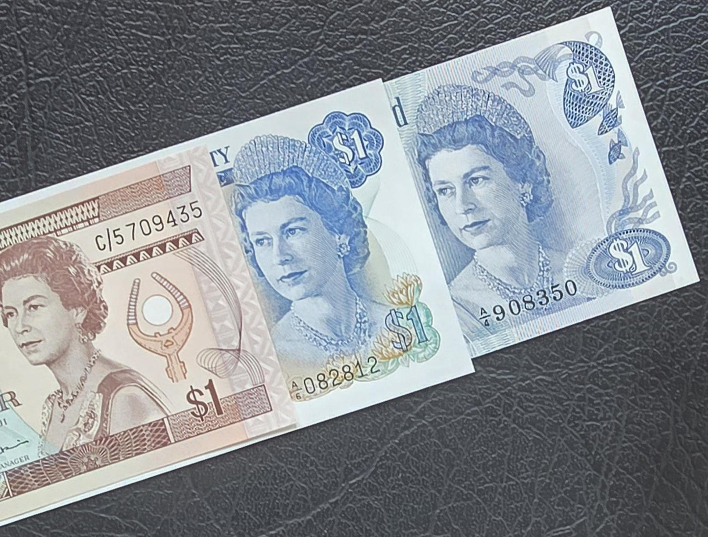 Queen set of 1 Dollar 1974- 1982 Fiji, Bermuda and Cayman Islands British Colonies Uncirculated UNC (three notes)