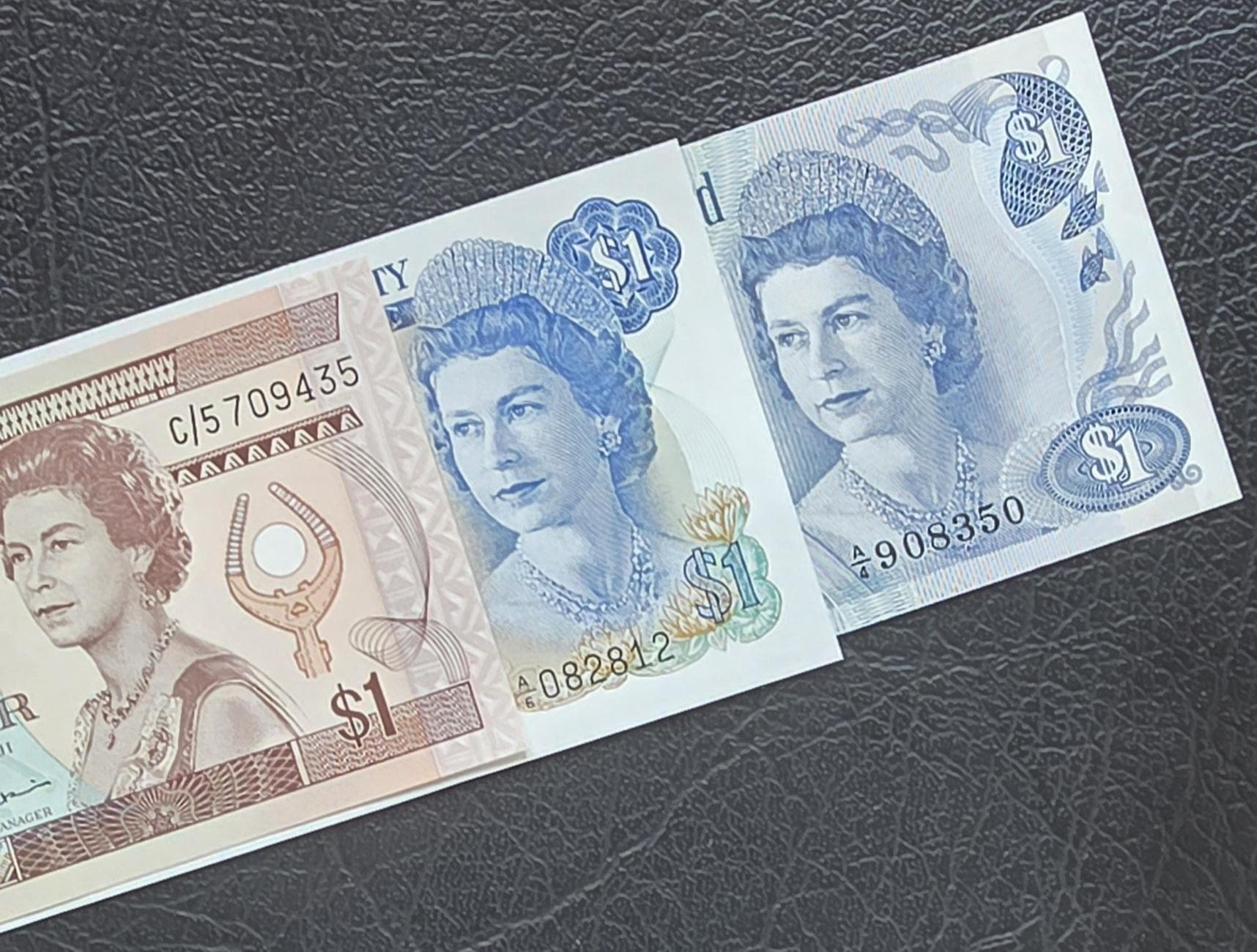 Queen set of 1 Dollar 1974- 1982 Fiji, Bermuda and Cayman Islands British Colonies Uncirculated UNC (three notes)