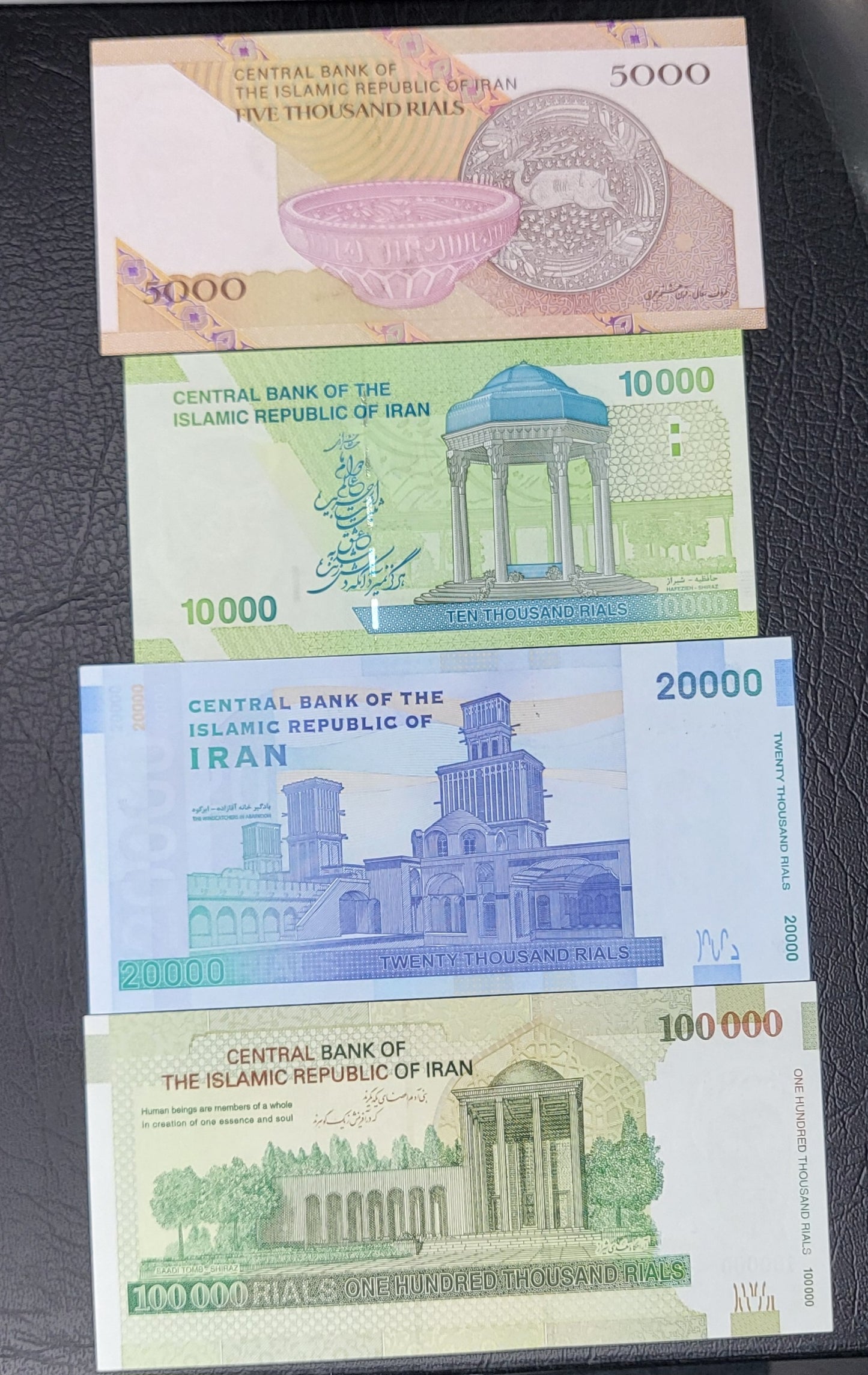 Set of 5000, 10000, 20000 and 100000 Rials Persian notes after 1979 Uncirculated Superb (Low and Matched Serial numbers 004999)