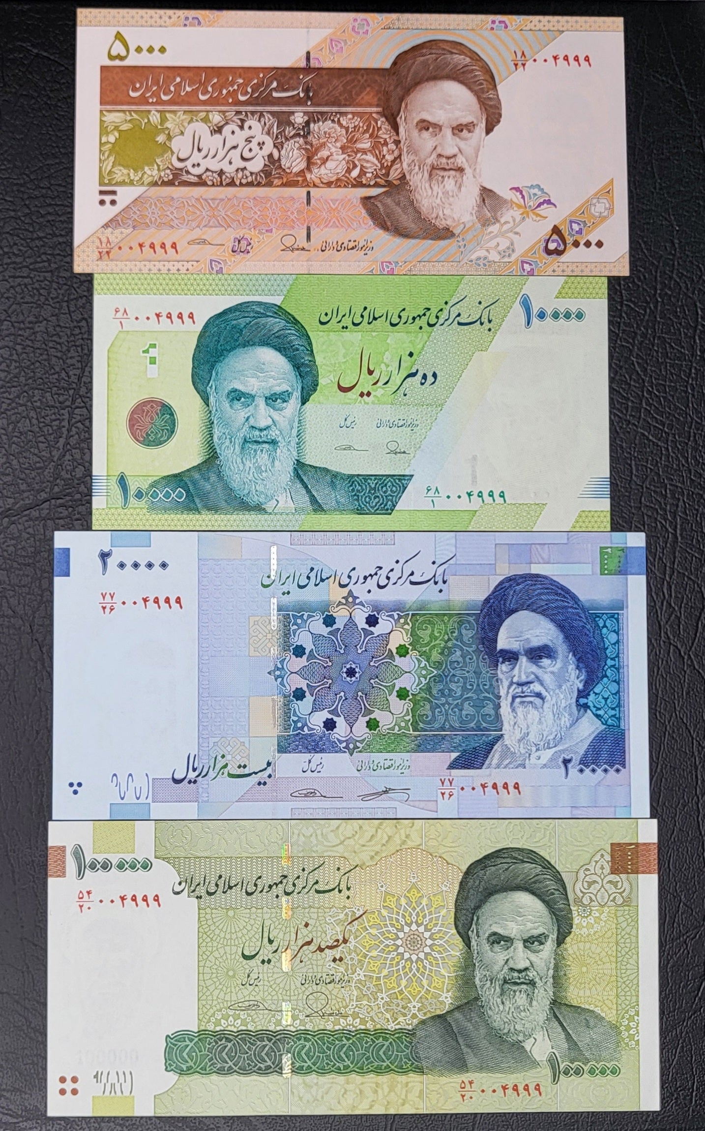 Set of 5000, 10000, 20000 and 100000 Rials Persian notes after 1979 Uncirculated Superb (Low and Matched Serial numbers 004999)