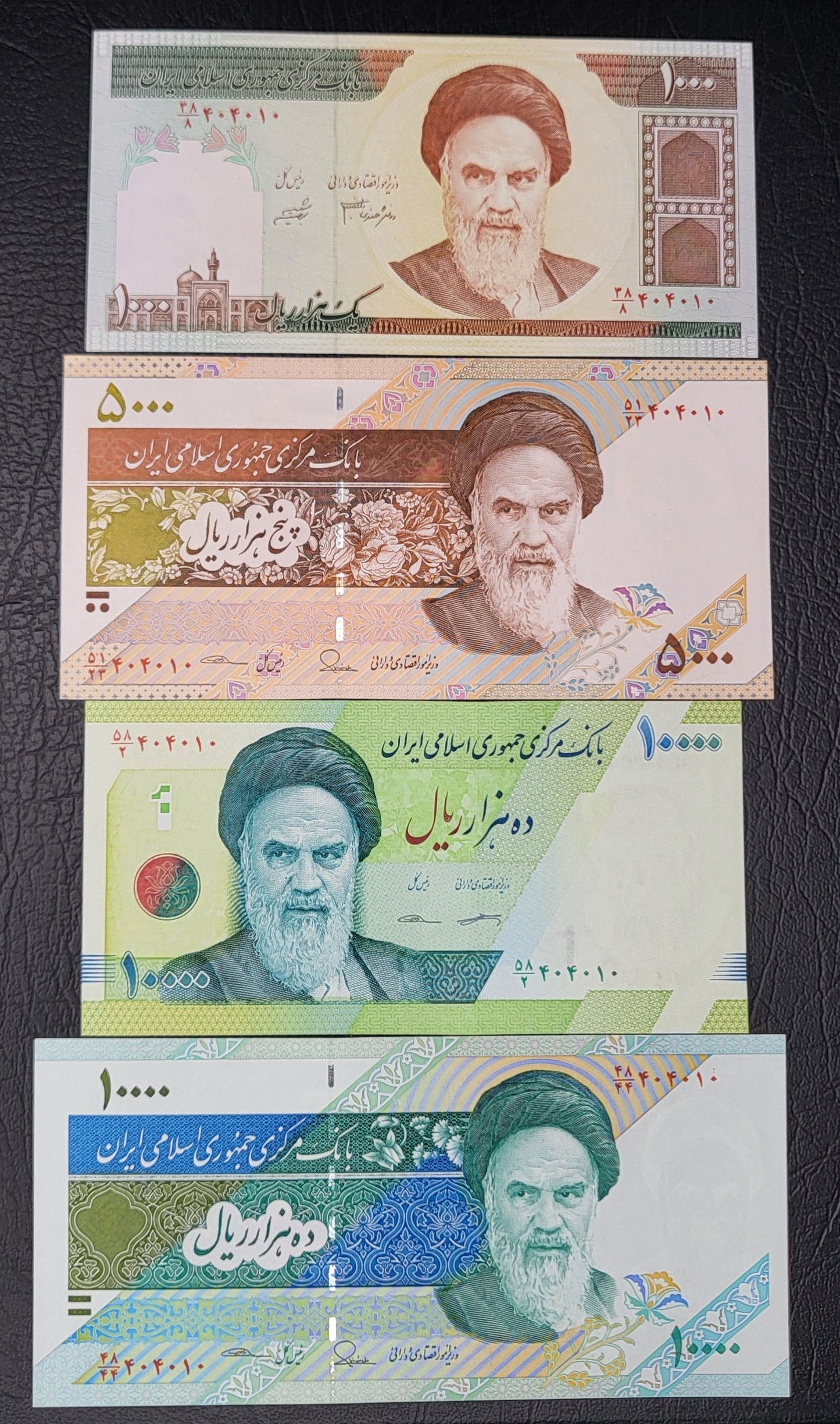 Set of 1000, 5000 and 10000 (two designs) Rials Persian notes after 1979 Uncirculated Superb (Matched Serial numbers 404010)